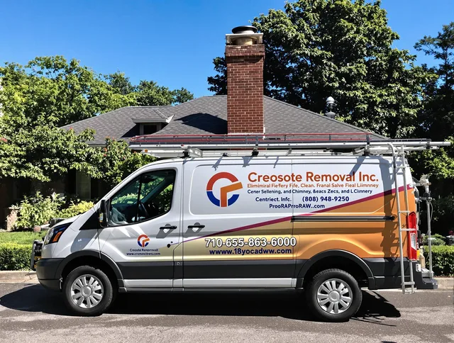 Oxford Chimney Sweep technician removing creosote safely in Oxford, CT