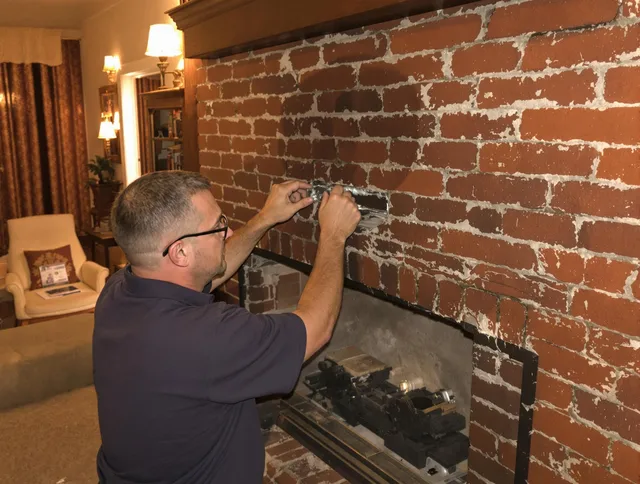 Oxford Chimney Sweep expert fixing a fireplace in Oxford, CT